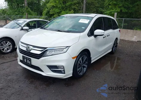 2018 Honda Odyssey Elite z USA, uszkodzony, nr VIN 5FNRL6H94JB008108